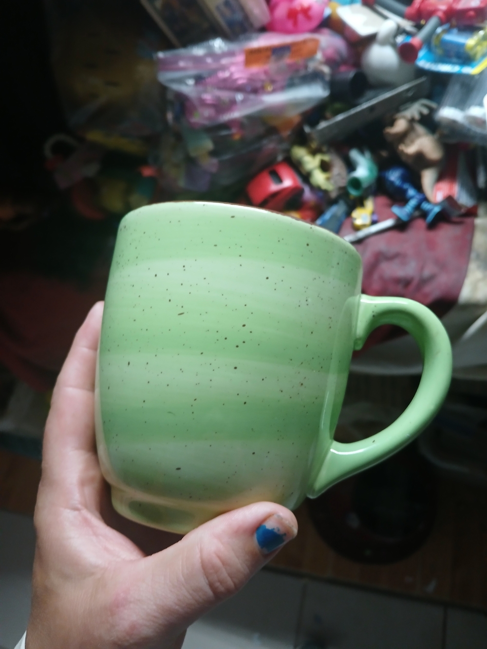light green ceramic coffee mug with a speckled glazed finish Home Wares
